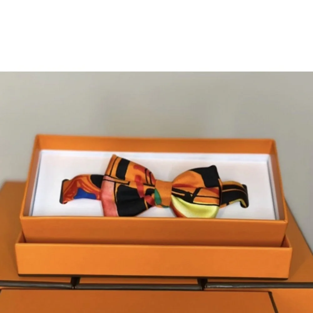 Little boys Hermes bow tie comes in original box